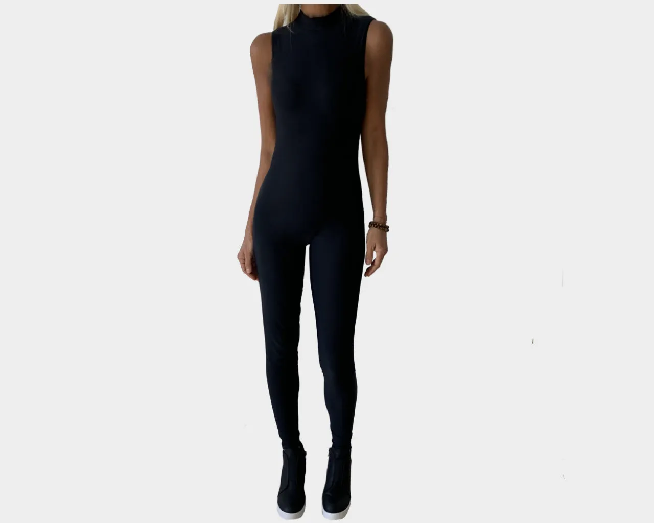 4. Bond Black One Piece Sleek Jumpsuit- The Milano